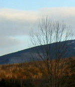 JPG photograph of sky and hills
